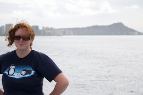 Ashley Stinson, today's guest blogger, is wearing a t-shirt showing penguins playing on the ice with Waikiki in the background.