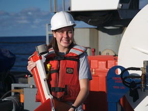 Dani holding a seismic bird, which she helped deploy on the seismic cable
